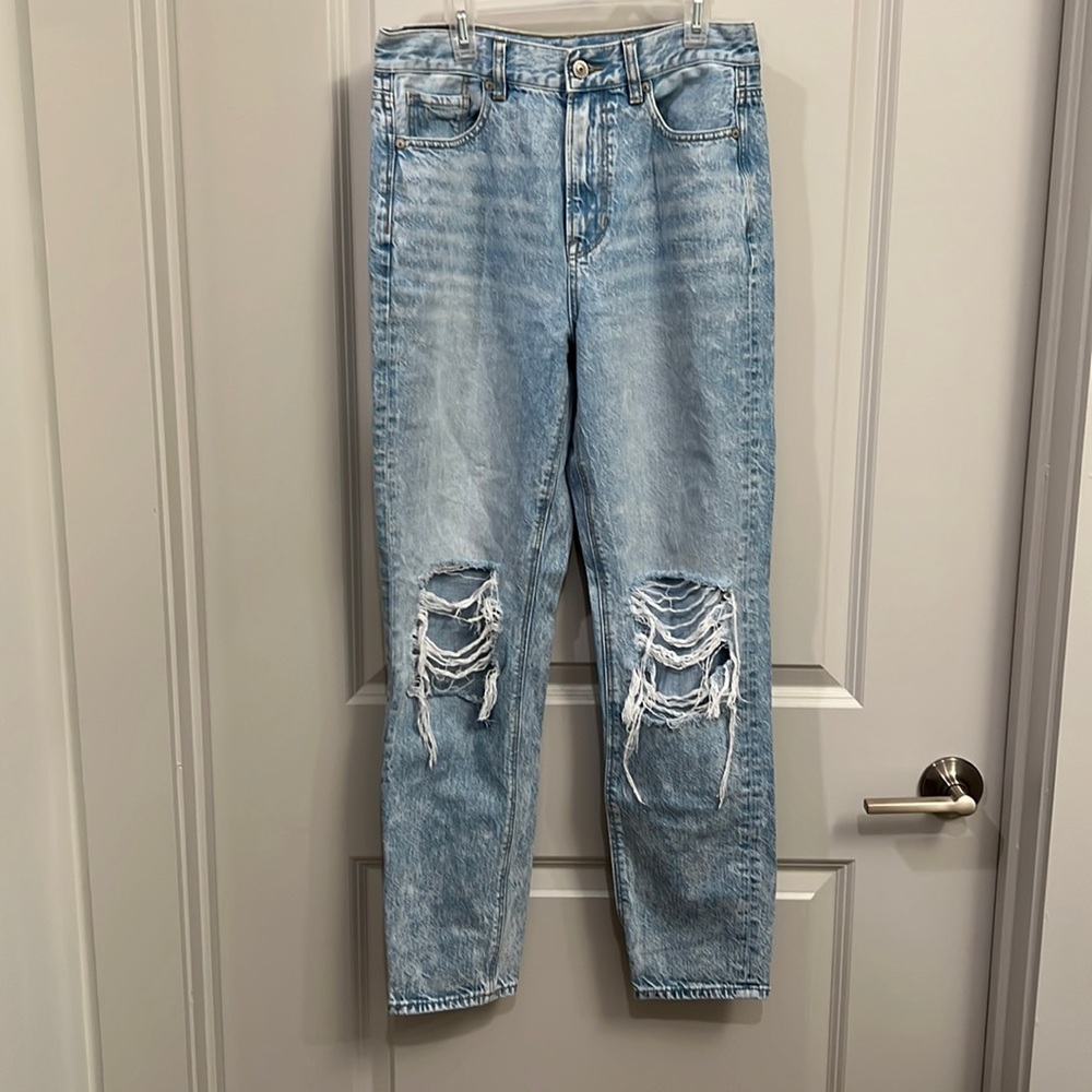 ripped stone wash mom jeans